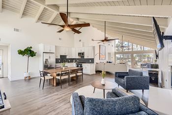Clubhouse with spacious tables and cozy chairs 